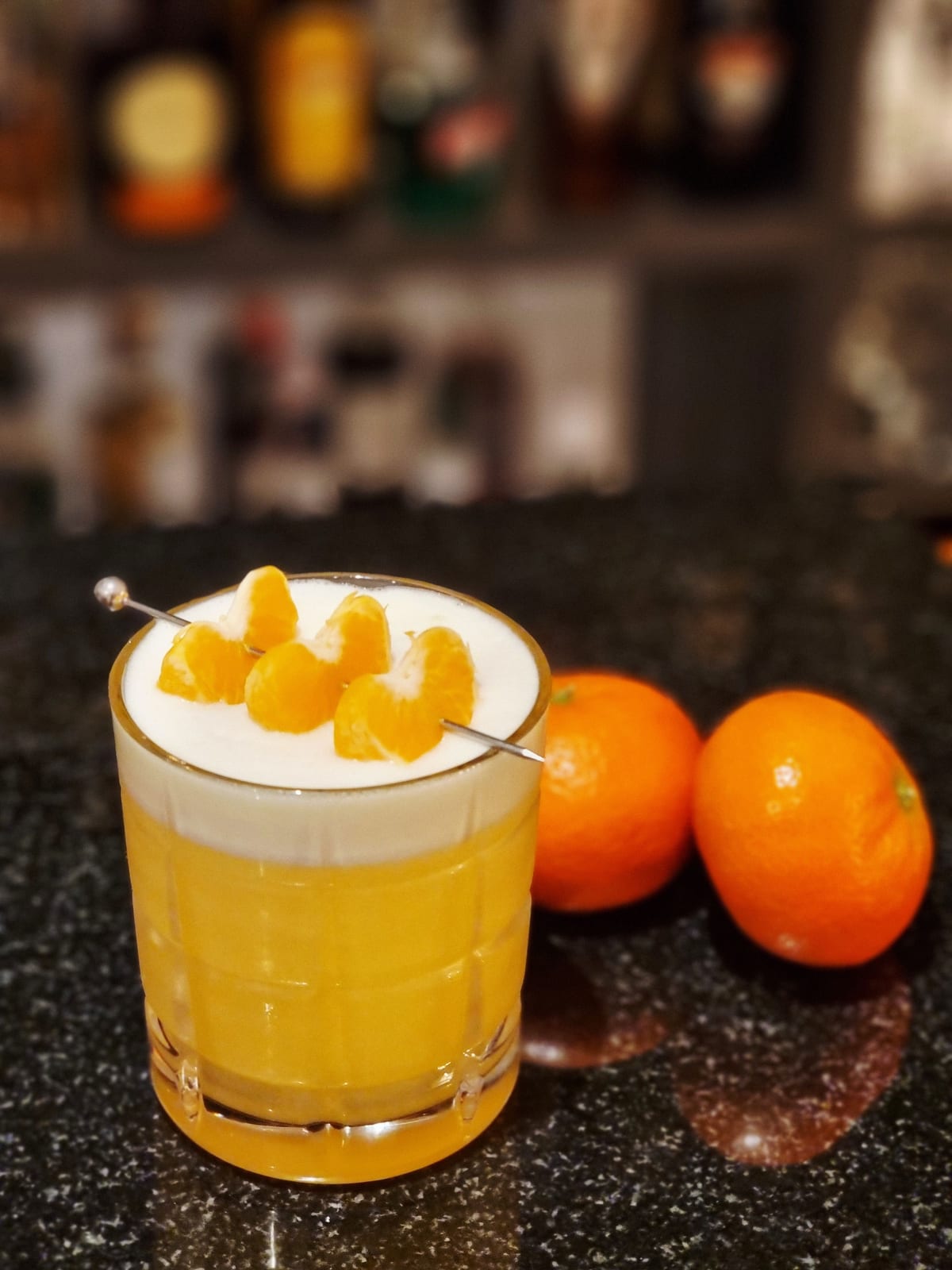 Clementine sour with a foam top
