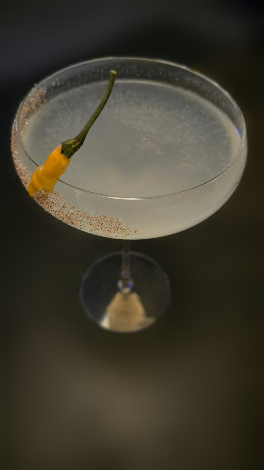 Mezcalita with a chilli salt rim and a yellow chilli